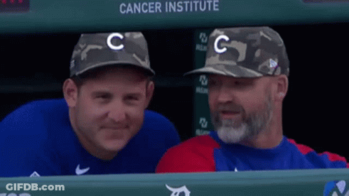 Baseball Players Smiling In Dugout GIF