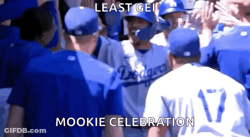 Baseball Players Standing In Crowd GIF