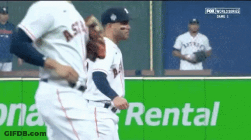 Baseball Players Standing Next To Rental Sign GIF