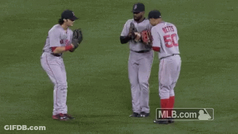 Baseball Players Standing On Field GIF