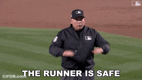 Baseball Umpire Calls Runner Safe GIF