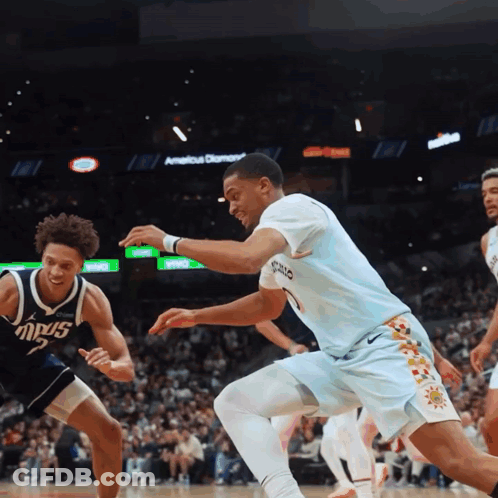 Basketball Game In Front Of Americus Diamond Sign GIF