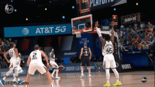 Basketball Game In Front Of AT T 5G Banner GIF