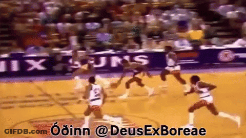 Basketball Game In Front Of Banner Saying Ix Suns GIF