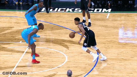 Basketball Game In Front Of Bucks Com Sign GIF