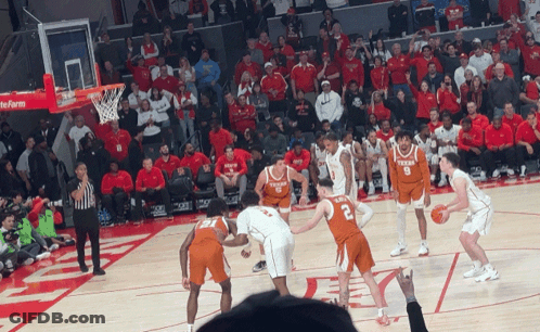 Basketball Game In Front Of Crowd In Red Shirts GIF
