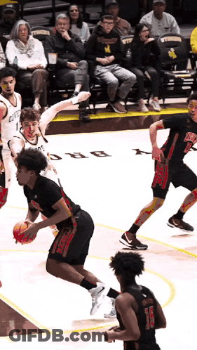 Basketball Game In Front Of Crowd In Stands GIF