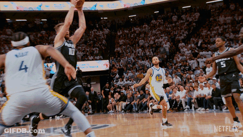Basketball Game In Front Of Crowd With Netflix Logo GIF