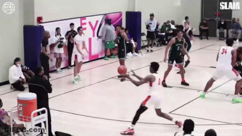 Basketball Game In Front Of Ey Wall GIF