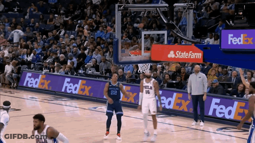 Basketball Game In Front Of FedEx Sign GIF