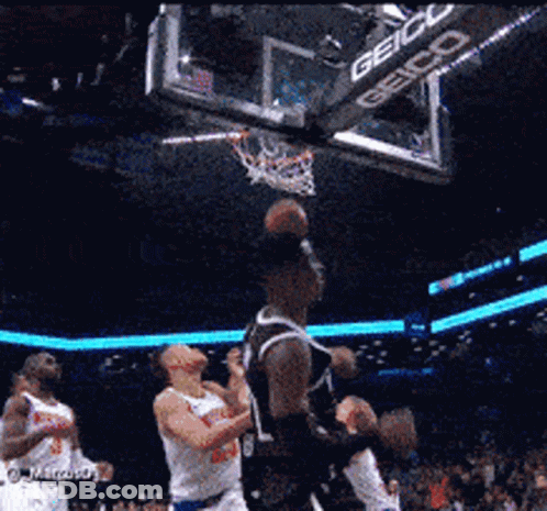 Basketball Game In Front Of Geico Sign GIF