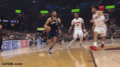 Basketball Game In Front Of Jerry West Sign GIF