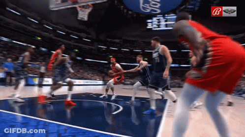 Basketball Game In Front Of Large Ford Sign GIF