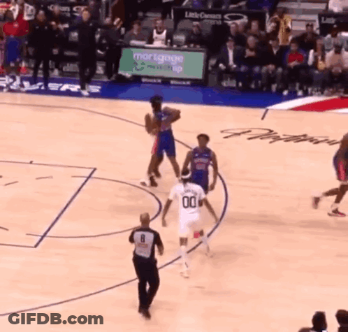 Basketball Game In Front Of Mortgage Ad GIF