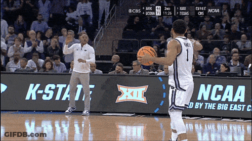 Basketball Game In Front Of NCAA Banner GIF