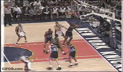 Basketball Game In Front Of New York Knicks Sign GIF