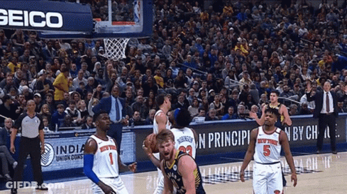 Basketball Game In Front Of Seiko Banner GIF