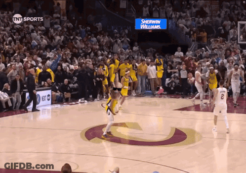 Basketball Game In Front Of Sherwin Williams Sign GIF