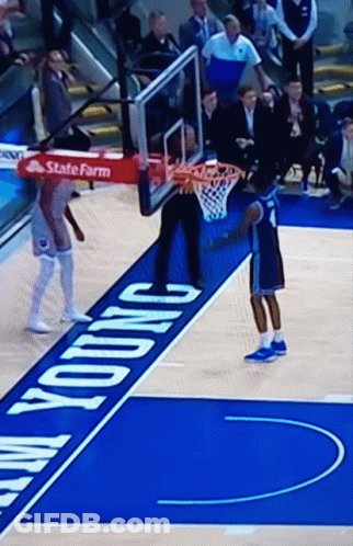 Basketball Game In Front Of State Farm Banner GIF