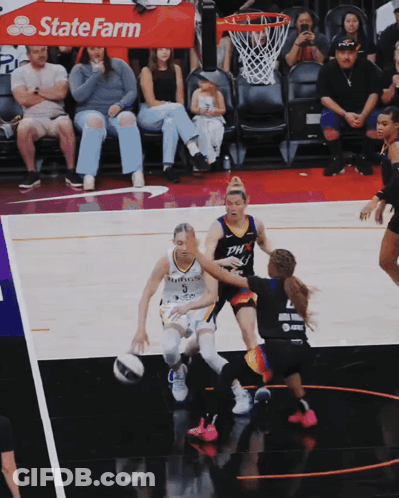 Basketball Game In Front Of State Farm Sign GIF