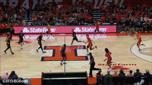 Basketball Game In Front Of Statefarm Sign GIF