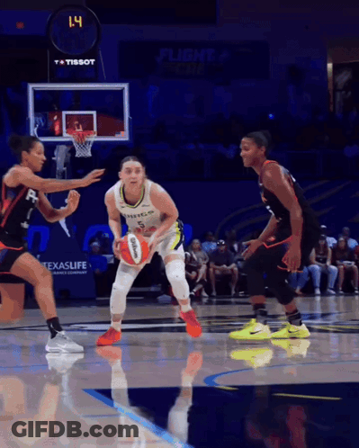 Basketball Game In Front Of Tissot Advertisement GIF