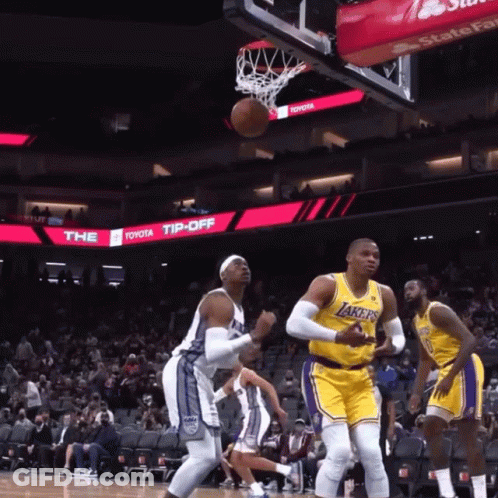 Basketball Game In Front Of Toyota Tip Off Sign GIF