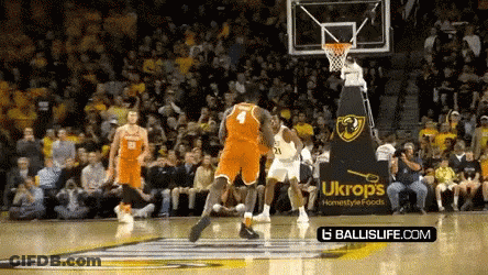 Basketball Game In Front Of Ukrops Ad GIF