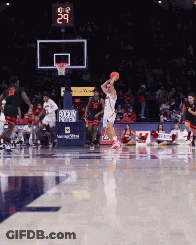 Basketball Game In Front Of Vintage West Sign GIF