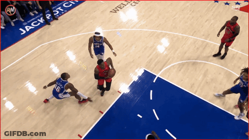Basketball Game In Front Of Wells Fargo Banner GIF