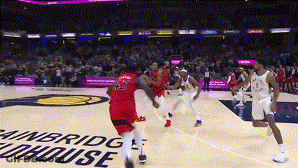 Basketball Game In Front Of Winbridge Funhouse Sign GIF
