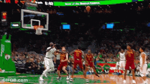 Basketball Game In Stadium With Scoreboard 5:52 GIF
