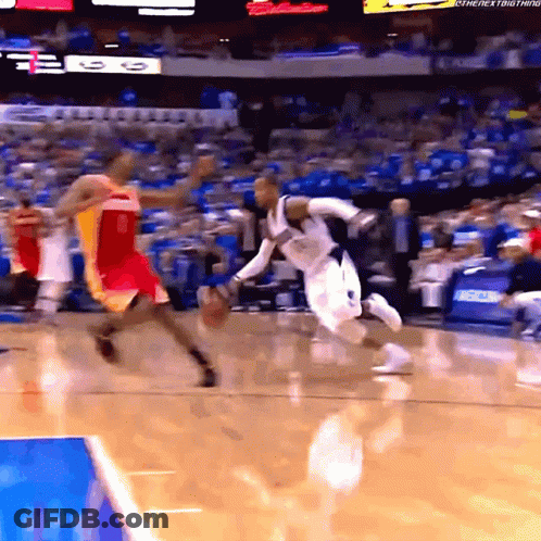 Basketball Game In Stadium With The Next Thing Sign GIF