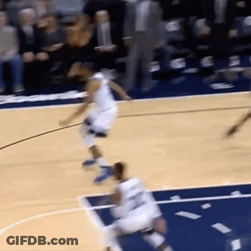 Basketball Game On Court With Blue Stripe GIF
