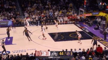 Basketball Game On Court With Crowd Watching GIF