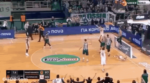 Basketball Game On Court With Green Lord Logo GIF