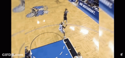 Basketball Game On Court With Orlando Magic Logo GIF