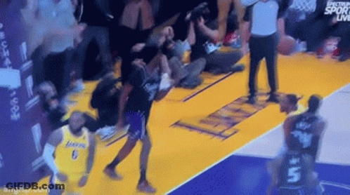 Basketball Game On Court With Spectators GIF