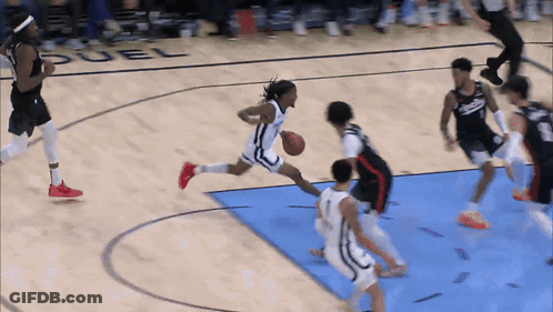 Basketball Game On Duel Court GIF