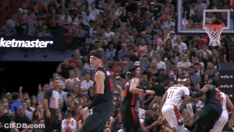Basketball Game Played Before Crowd With Ketmaster Ad GIF