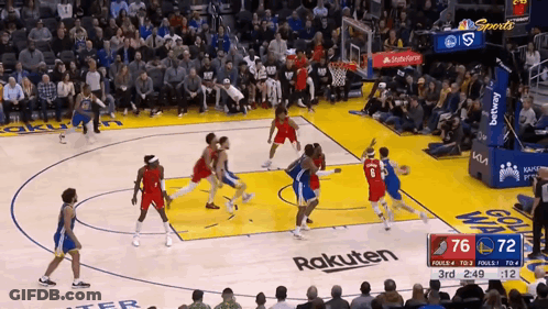 Basketball Game Scoreboard 76-72 In Front Of Crowd GIF