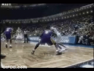 Basketball Game With Com Banner In Stadium GIF