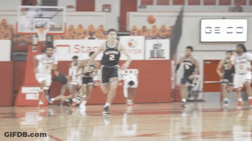 Basketball Game With Geico Sign GIF