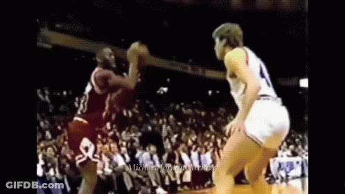Basketball Game With Michael Jordan In Corner GIF