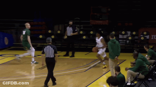 Basketball Game With Referee In Mask GIF
