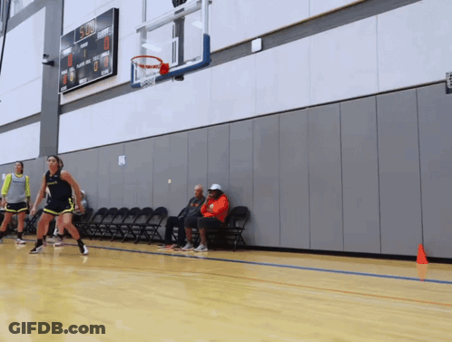 Basketball Game With Scoreboard Showing 5:00 GIF