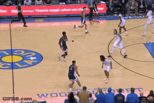 Basketball Game With Sign Saying Real Magic When We Cheer GIF
