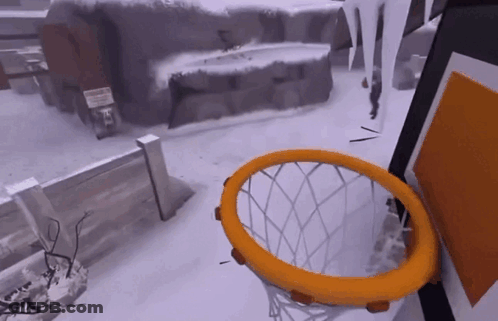 Basketball Hoop In Snow With Sign GIF