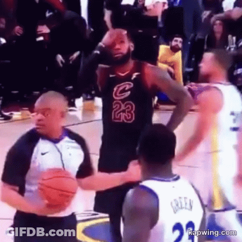 Basketball Player 23 Next To Referee Holding Basketball GIF