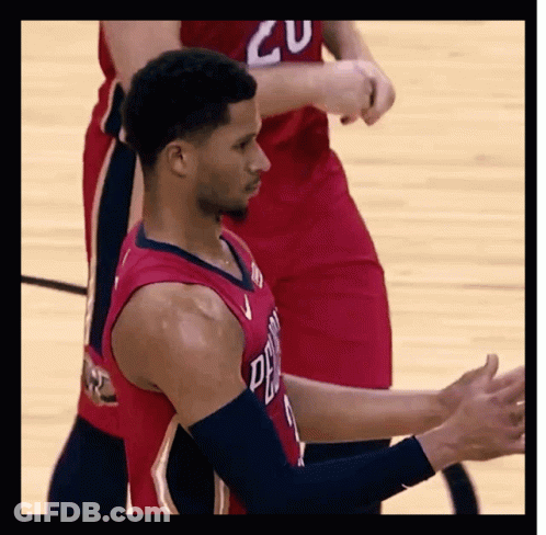 Basketball Player Clapping With Red Jersey Number 20 GIF